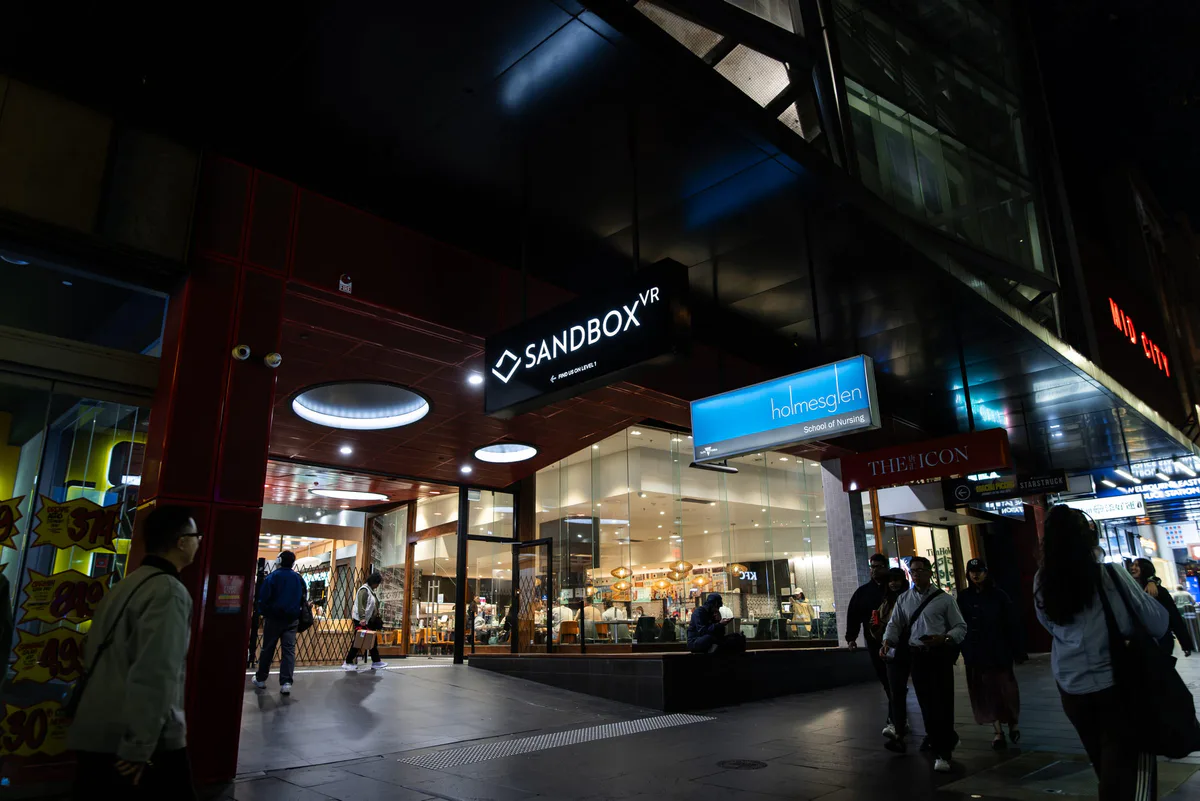 Sandbox VR signage over a shopfront in a Melbourne arcade
