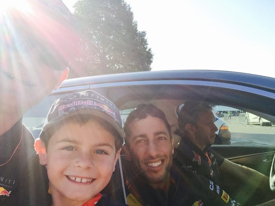Young Jack with an F1 pit crew