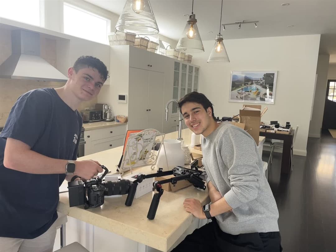 Jack unboxing new camera gear with a mate