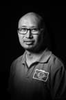 John Tam, black and white studio portrait