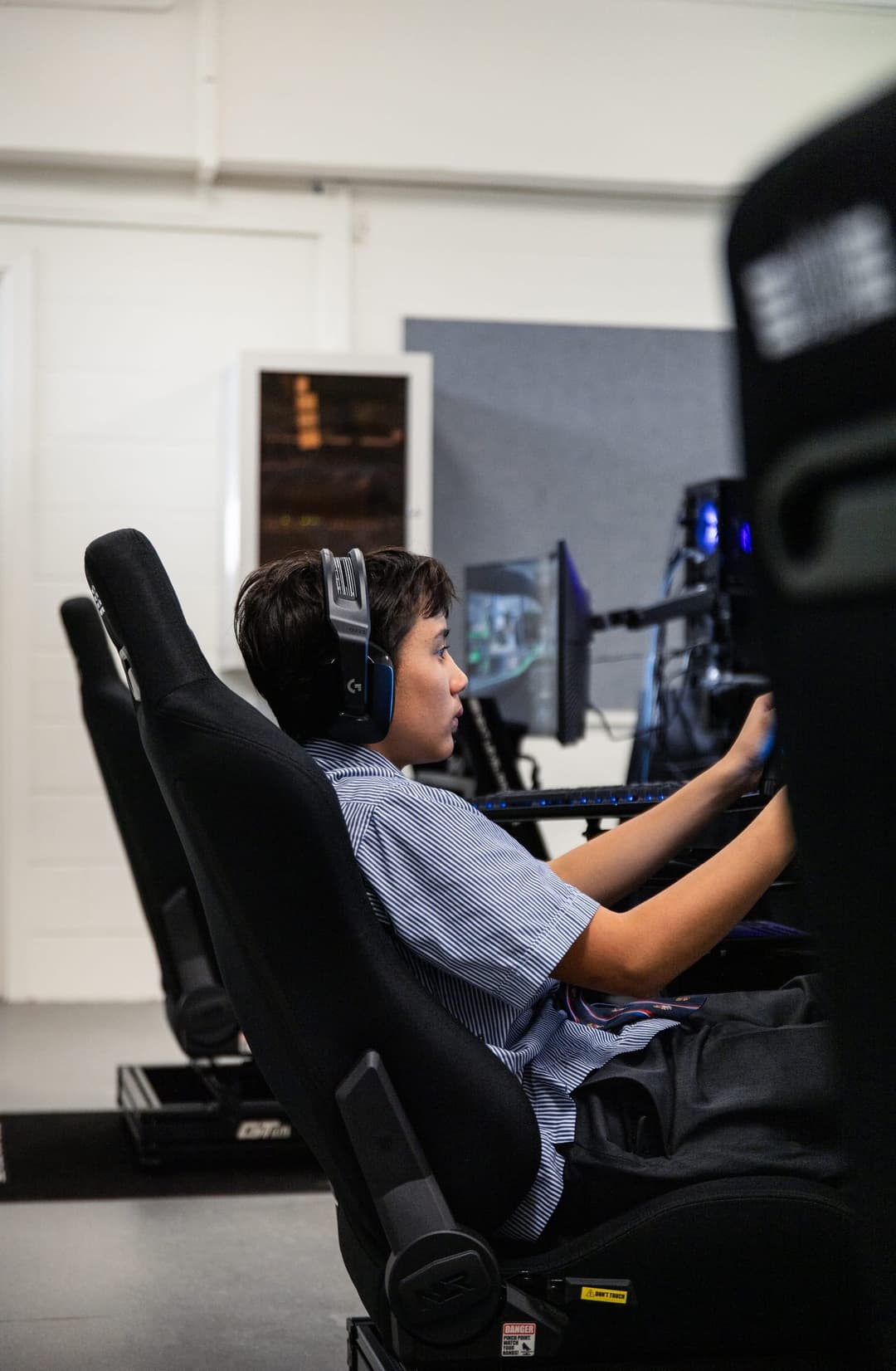 Brighton Grammar student in a sim-racing rig, F1 in Schools