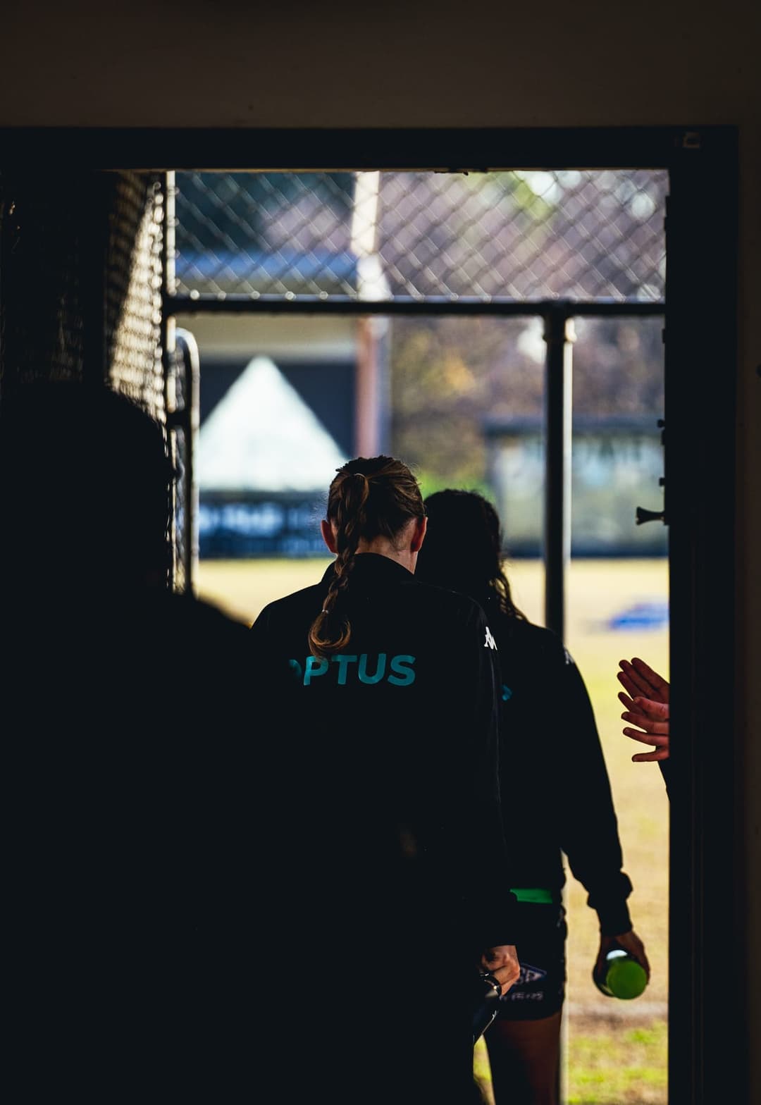 Calder United players walking out through the changeroom doorway to the ground. Frame 2 of 12. Open it