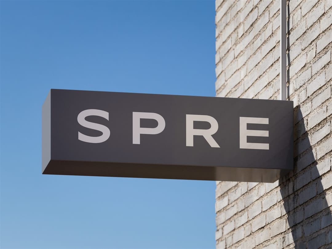 SPRE brand applied to signage