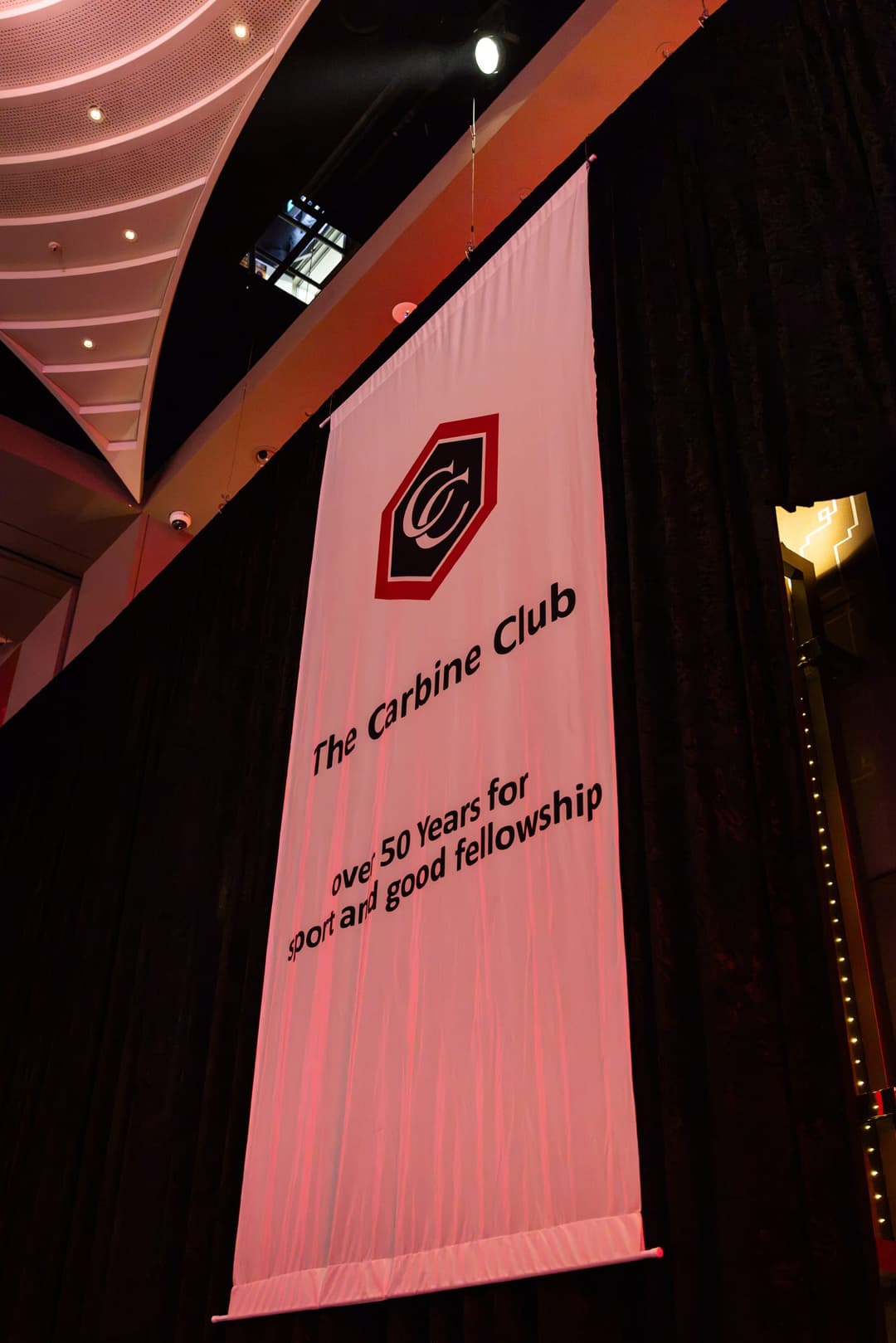 A Carbine Club banner hanging in the ballroom