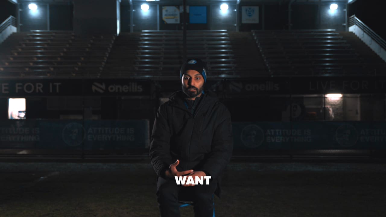 Kogulan Sabaratnam coaching from the sideline on match day